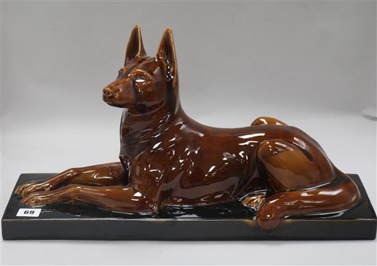 An Art Deco ceramic model of a dog width 52cm height 30cm